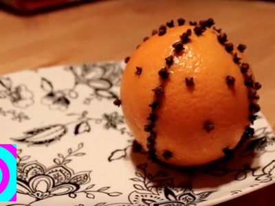 Decoraciones Navideñas: Naranjas con Clavos de Olor