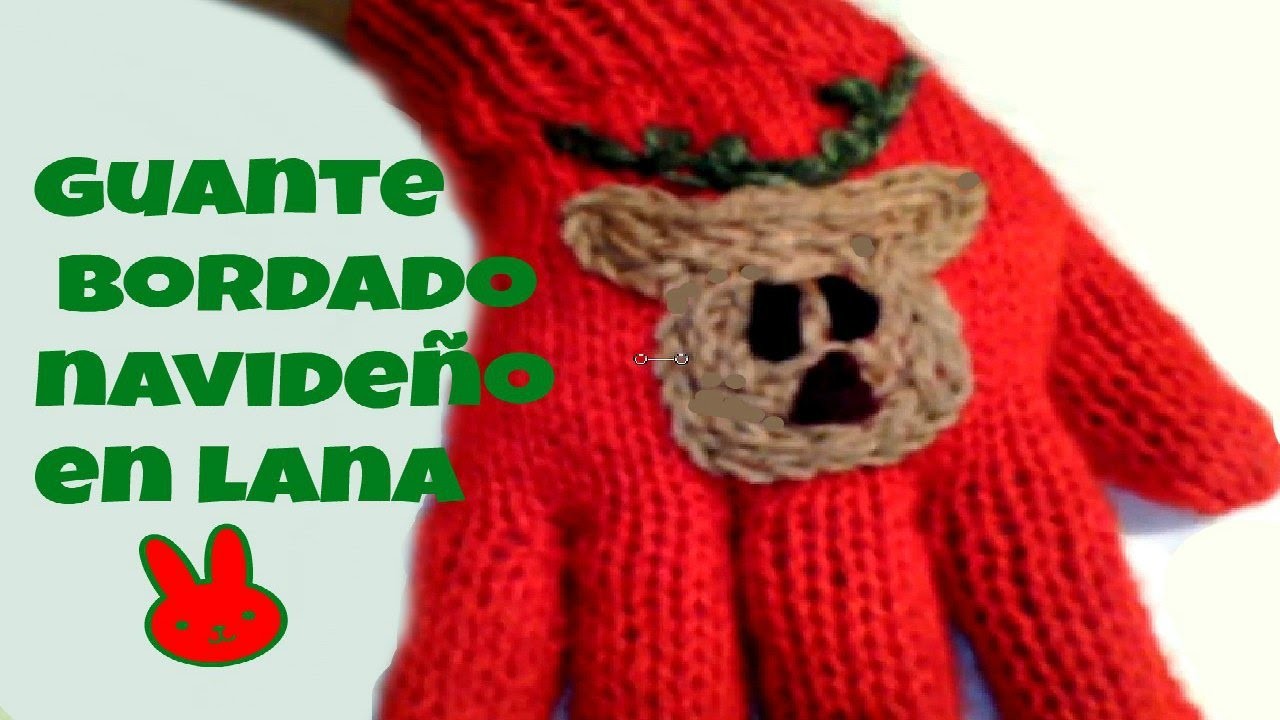 Guante con bordado navideño.Christmas glove with embroidery