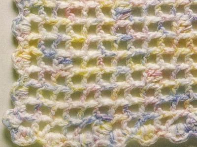 Como tejer manta a punto de red a crochet