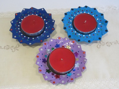 Portavelas con latas