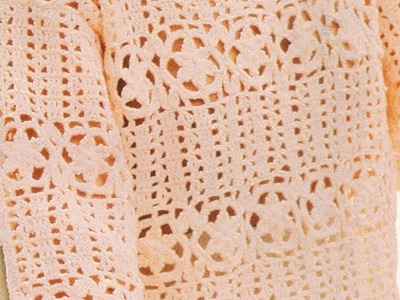 Suéter calado rosetas en franjas a crochet rosa palo