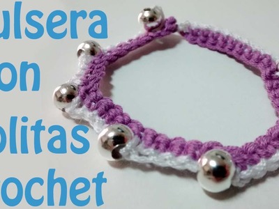 Pulsera de ganchillo con bolitas. Crochet bracelet with beads.