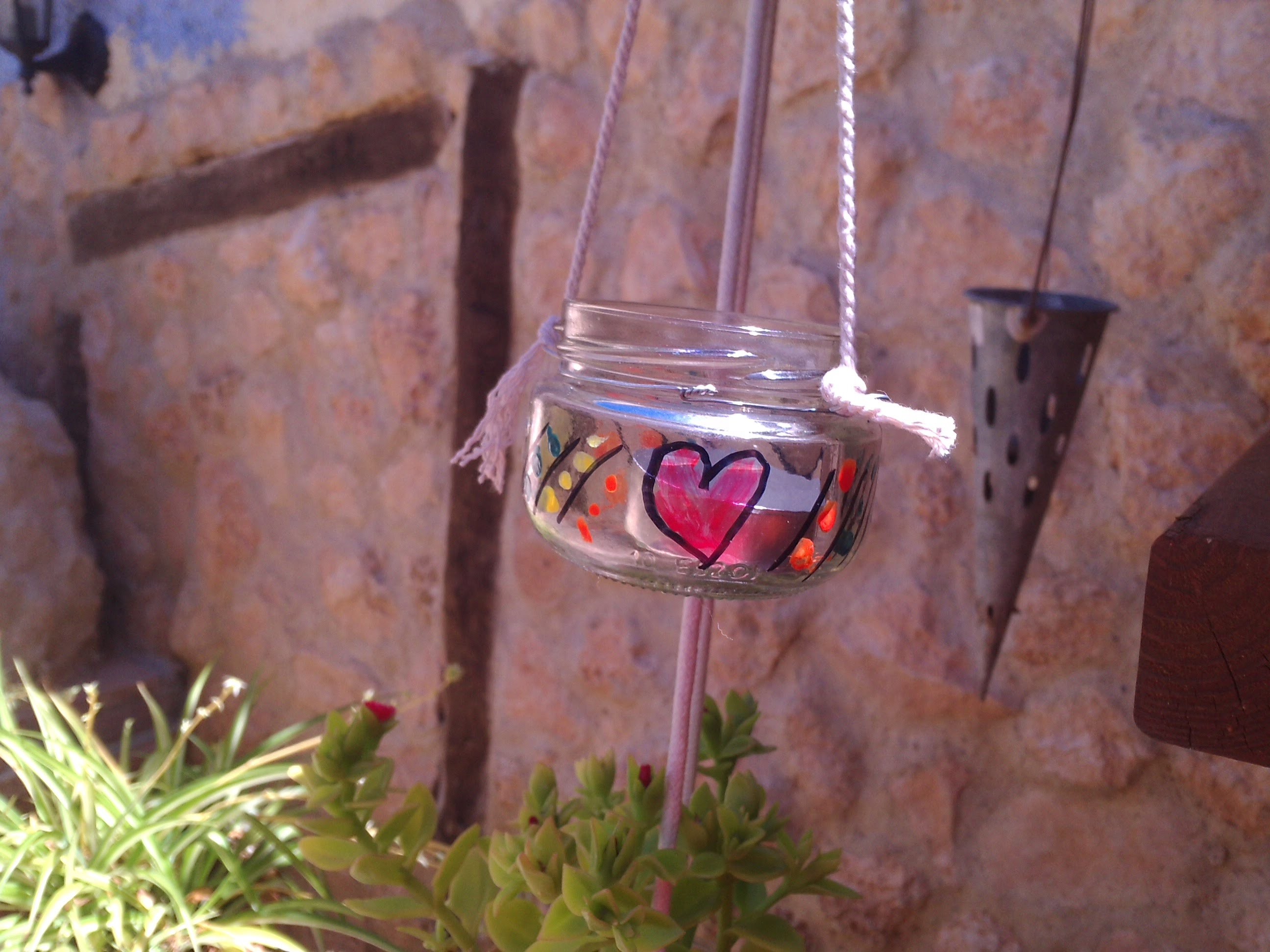 Manualidades ecológicas: Portavelas de exterior reciclados