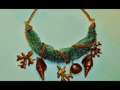COLLAR DE CARACOLAS Y CONCHAS.Necklace made of shells and corals