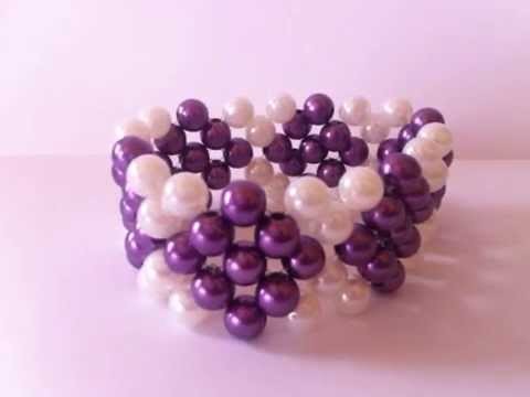 Pulcera de perlas moradas con blanco (ROMBOS)