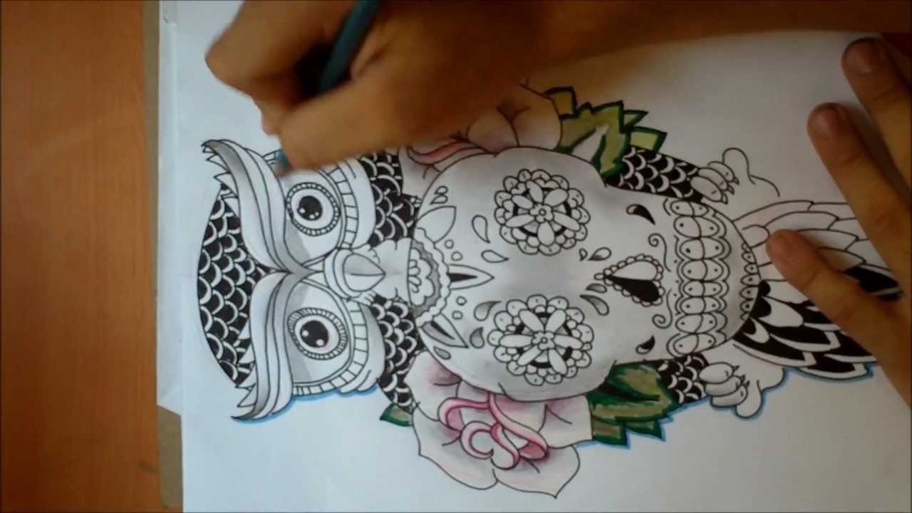 Jack arevalo - dibujando un búho sosteniendo una calabera