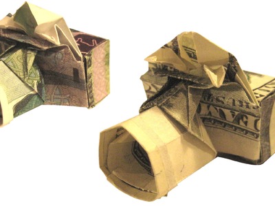 Origami de dinero. Сámara fotográfica