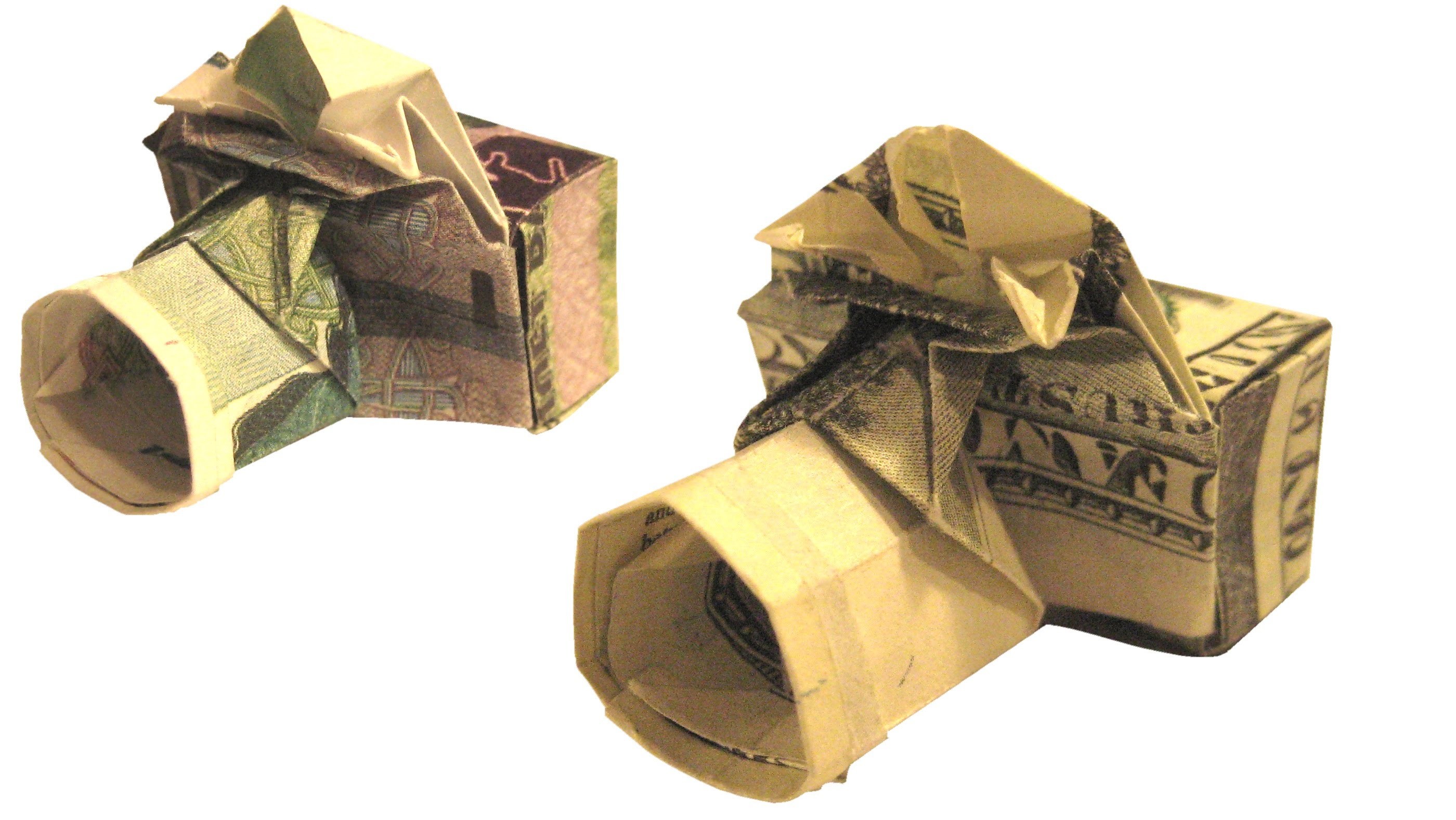Origami de dinero. Сámara fotográfica