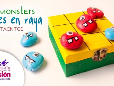Manualidades juego de Tres en Raya. Dibujo de monstruos en piedras con colores.