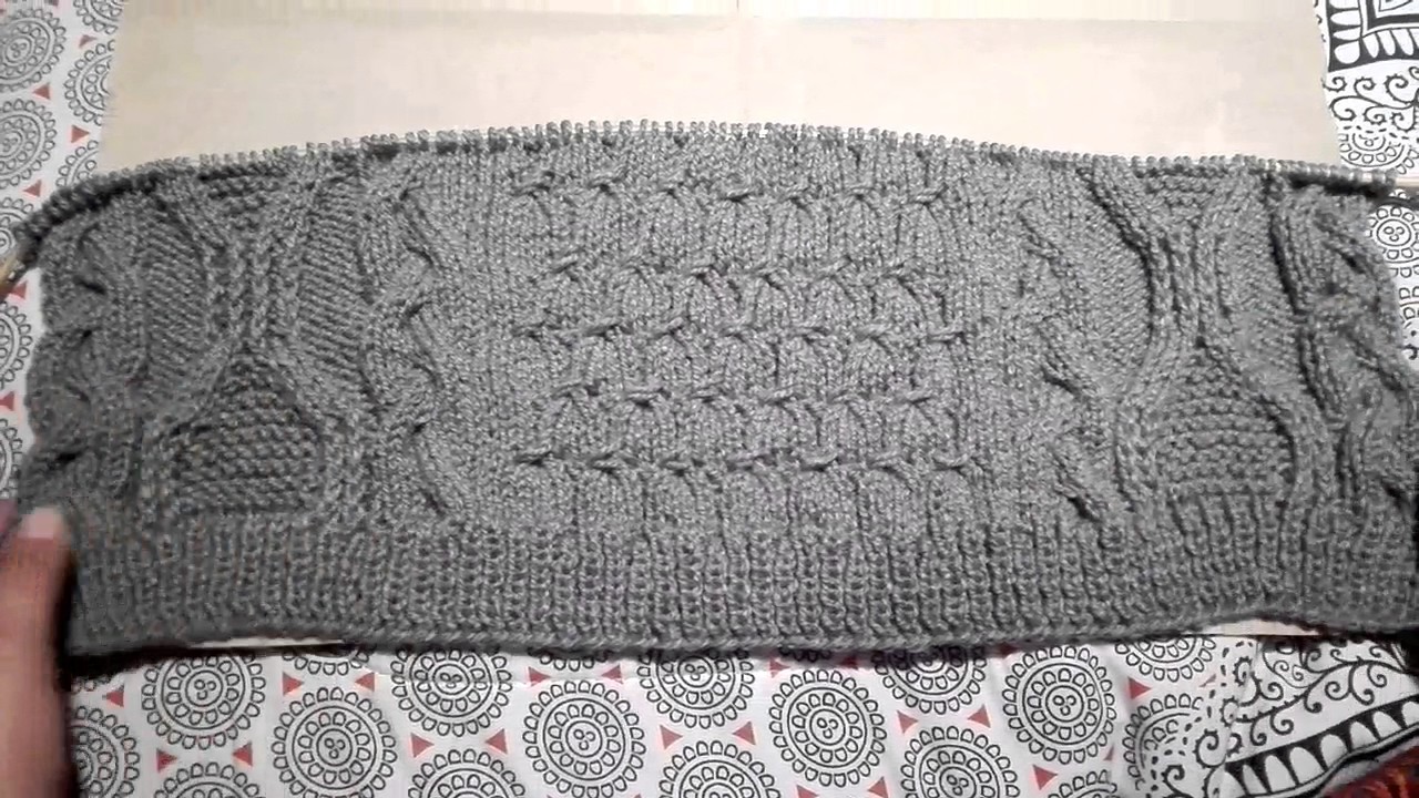 Suéter tejido con mix de puntos a palillos