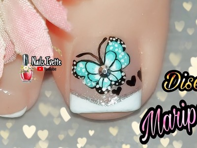 Uñas de los pies decoradas con mariposa. decoración de uñas mariposa turquesa. diseño mariposa