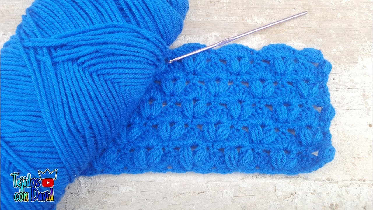 Combinación de arcos con puntos puff a crochet