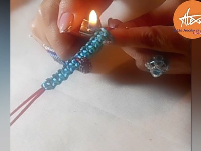 TEJIDO DE PULSERA EN NUDO PLANO