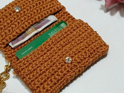 Monedero tejido a crochet con tres bolsillos.Üç cepli tığ işi çanta.Bolsa de crochê com três bolsos