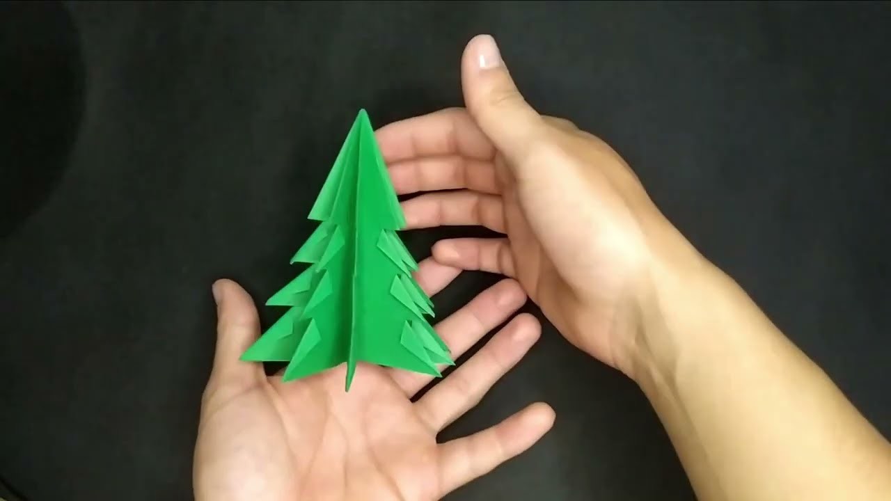 Como hacer árbol navideño de papel. How to make paper Christmas tree