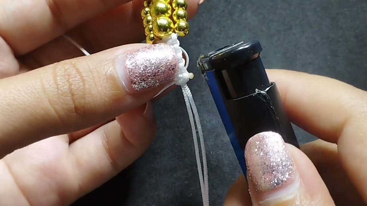 Como hacer pulsera de nudo plano con balines. How to make a flat knot bracelet with pellets