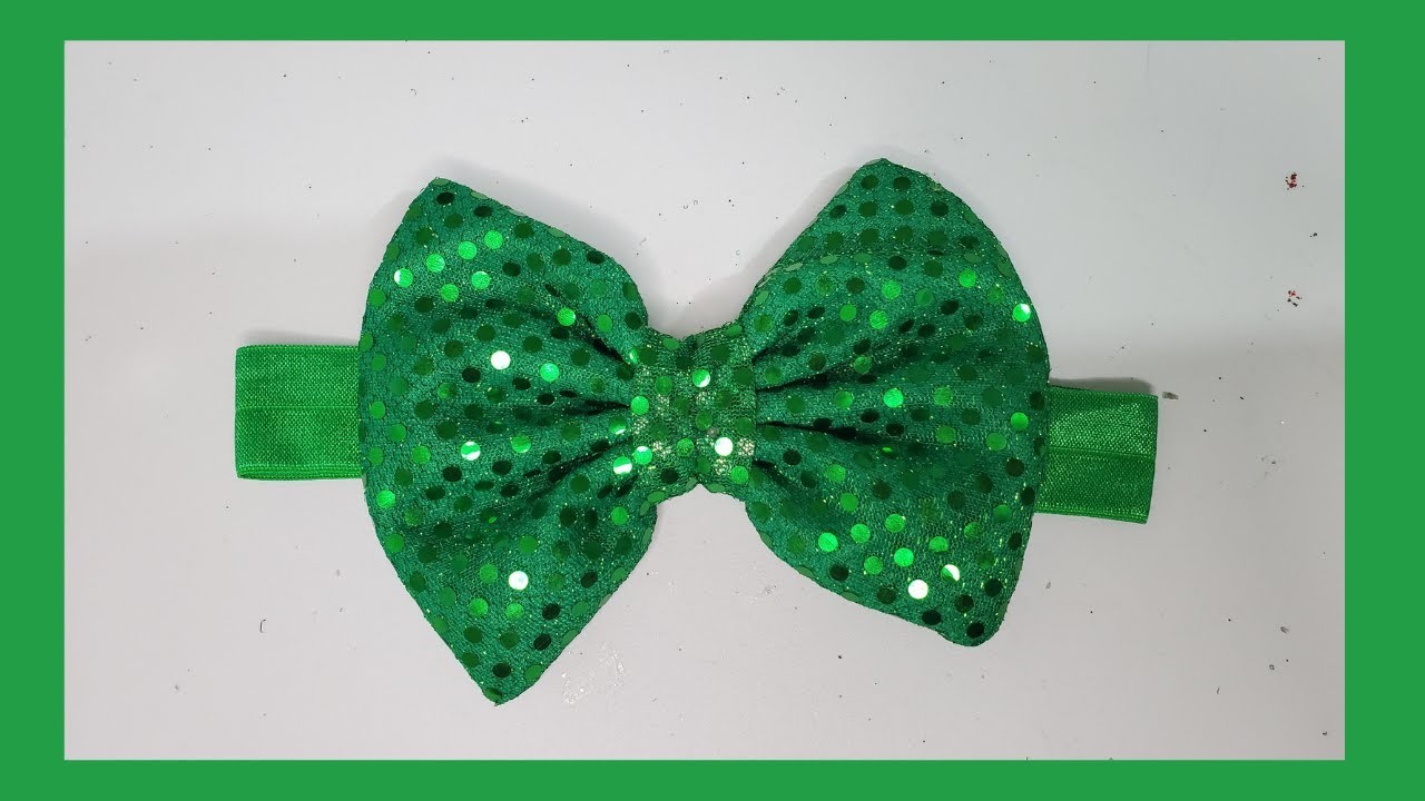 Diadema Navideña. Lazo o moño con brillo