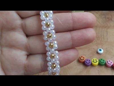 Pulsera tejida con perlas patrón de flores aprendiendo técnicas nuevas pulsera de flores con perlas